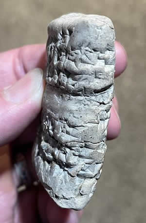 Cuneiform ceramic tablet 2500-1000 BC with text on side