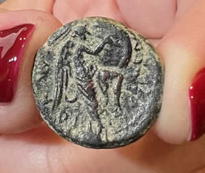 84 AD Agrippa II coin with Domitian and Nike writing on shield