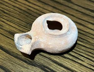 Used around 30 AD a Herodian oil lamp with a design produced from 63 BC &ndash; 200 AD