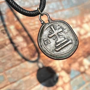 1143-1180 AD - Byzantine Emperor Manuel I Komnenos IC for First and Last letters of JESUS in Greek. The cross is on a three-step pedestal &ndash; REVERSE, bronze coin